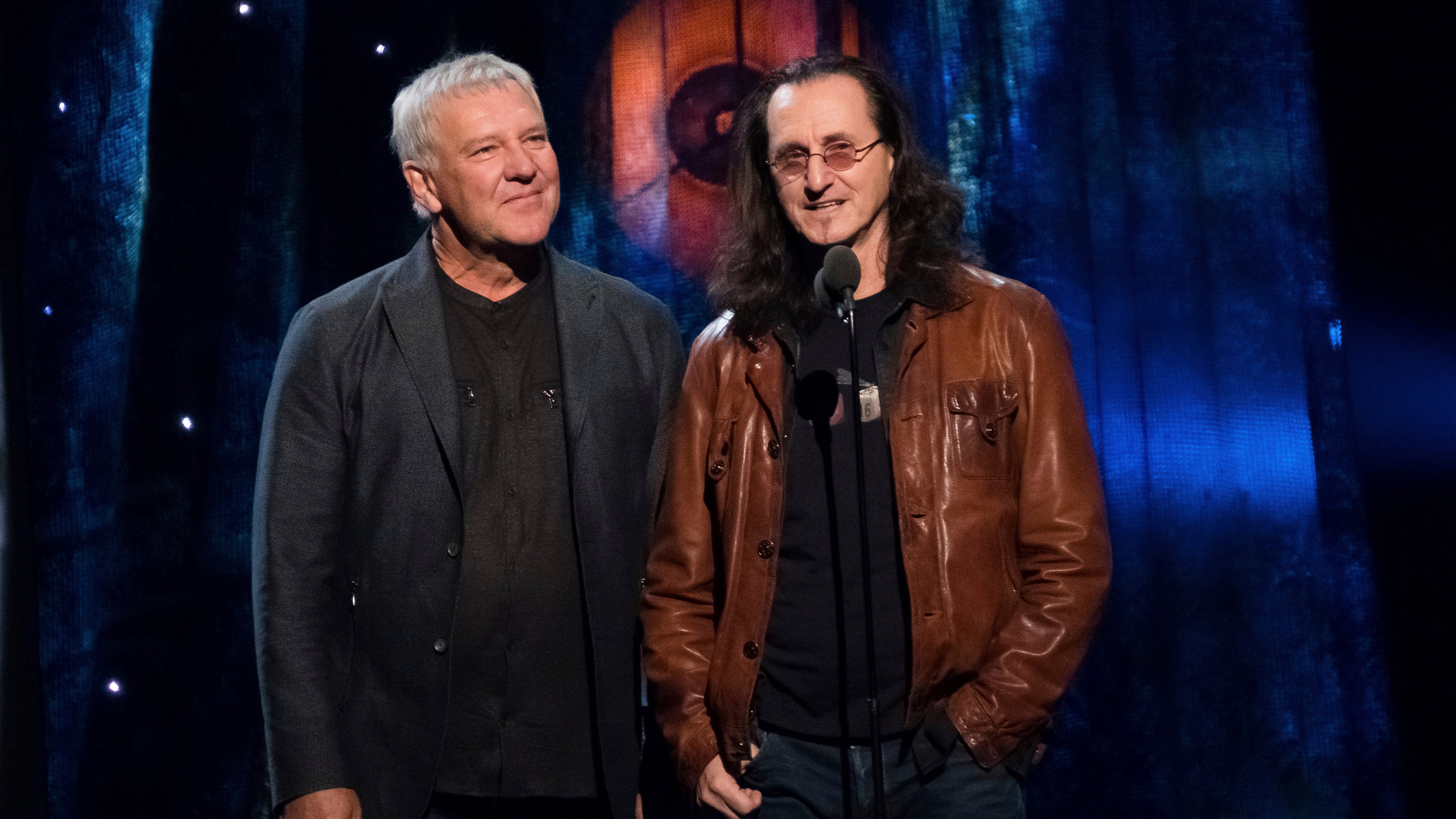 FILE - Alex Lifeson, left, and Geddy Lee from the band Rush appear at the 2017 Rock and Roll Hall of Fame induction ceremony on April 7, 2017, in New York. (Photo by Charles Sykes/Invision/AP, File)