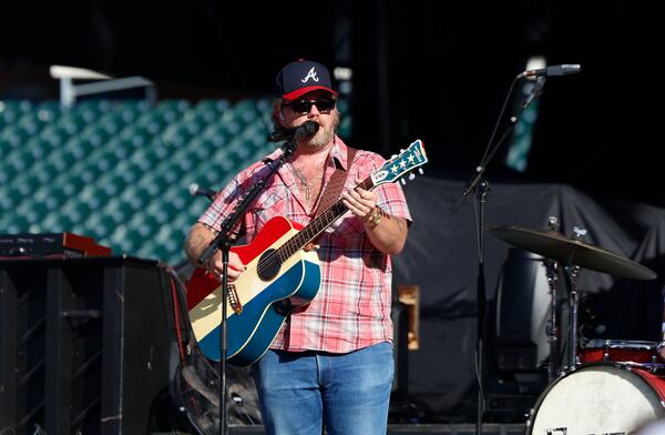 Ernest performs at Braves Country Fest on Saturday, June 13, 2026, at Truist Park. Ernest started off his set with "The Star-Spangled Banner," before getting to his songs "Gettin' Gone" and "Boat Named After You." (Akili-Casundria Ramsess for the AJC)