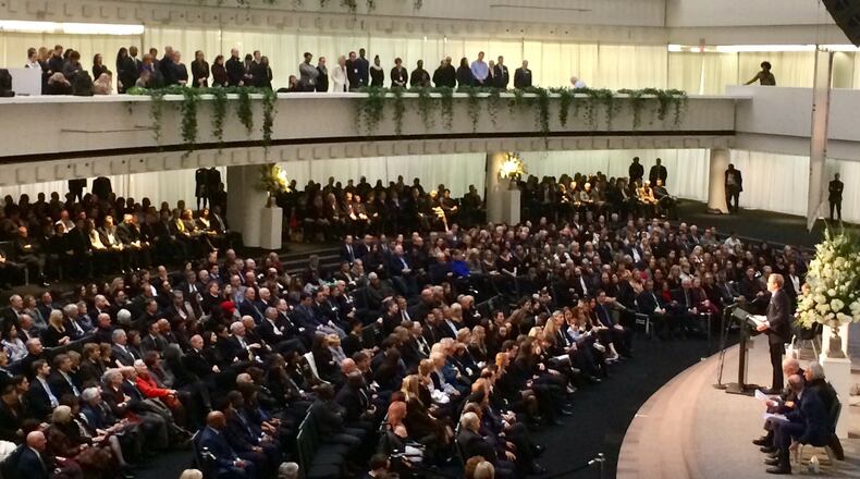 Jarel Portman, a son of legendary Atlanta architect and developer John C. Portman Jr., standing at right, gives a eulogy during a memorial service for his father at AmericasMart in downtown Atlanta on Friday, Jan. 5, 2018. The elder Portman died Dec. 29, 2017, at age 93. J. SCOTT TRUBEY/STRUBEY@AJC.com.