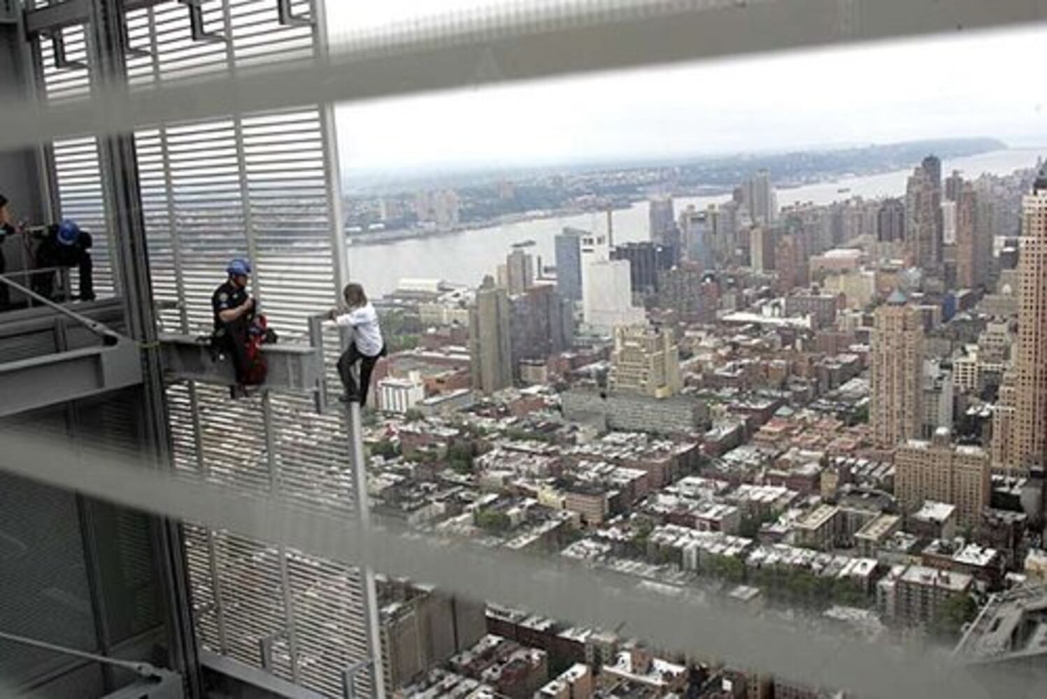 Two daredevils scale New York Times building