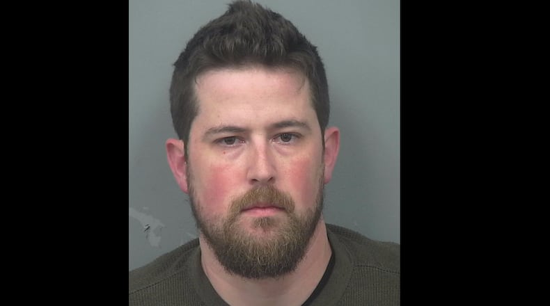 Keri Sean McNaughton, 33, has been charged with terroristic threats and acts after allegedly threatening to shoot his wife in the head.