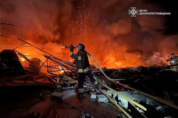 In this photo provided by the Ukrainian Emergency Service, firefighters put out the fire following Russia's drones attack in Kamianske, Dnipropetrovsk region, Ukraine, Wednesday, April 16, 2025. (Ukrainian Emergency Service via AP)