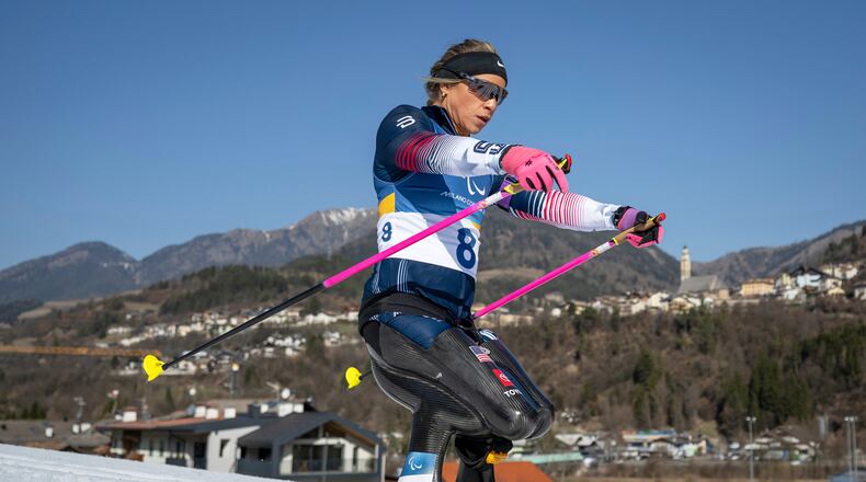 Oksana Masters of the US competes during the Para Biathlon Men's Individual Sitting competition at the 2026 Winter Paralympics, in Tesero, Italy, Sunday March 8, 2026. (Joel Marklund/OIS/IOC via AP)