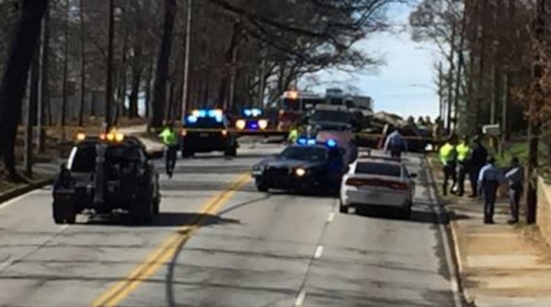 Two people were killed and a 7-year-old was injured Friday in Atlanta when a truck struck a car head-on after a chase. (Credit: Channel 2 Action News)