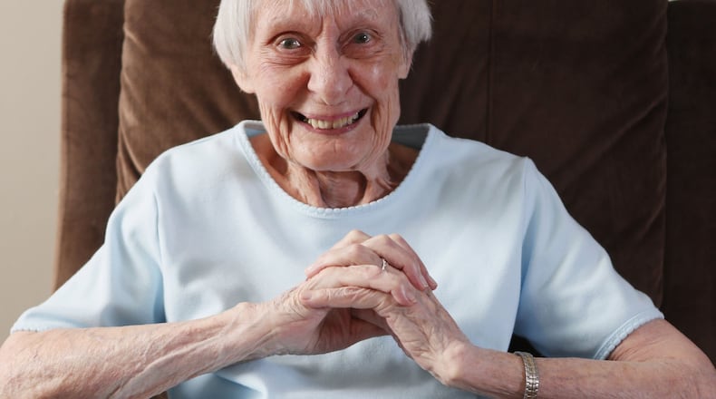 Janice Benario, photographed in her Decatur apartment, is a 95-year-old resident who served as a World War II WAVE working on part of the Enigma project. BOB ANDRES /BANDRES@AJC.COM