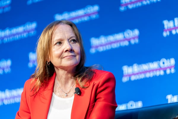 FILE- Mary Barra, chair and CEO of General Motors, talks to David Rubenstein during an interview hosted by the Economic Club of Washington, Wednesday, Dec. 13, 2023, in Washington. (AP Photo/Stephanie Scarbrough, File)