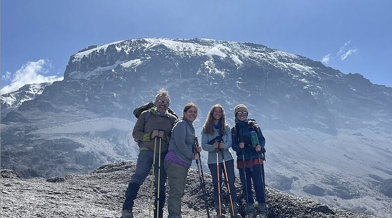 From left, James and Christy Howard stand for a photo with their daughters, Gracie and Lucy. Christy Howard, a 50-year-old Chattanoogan with epilepsy, and her family climbed Mount Kilimanjaro in July. (Contributed photo)