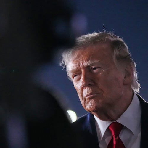 President Donald Trump talks with reporters before boarding Air Force One at John F. Kennedy International Airport in New York, early Tuesday, June 9, 2026. (AP Photo/Mark Schiefelbein)