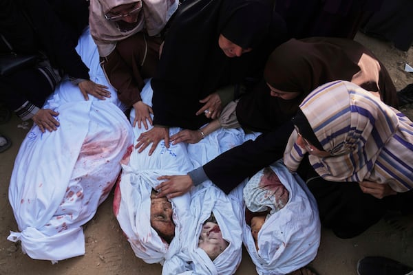 Palestinians mourn children from their families who were killed in Israeli airstrikes in Jabalia, in the northern Gaza Strip, on Wednesday, May 14, 2025. According to local hospitals, the strikes killed 48 people, including 22 children. (AP Photo/Jehad Alshrafi)