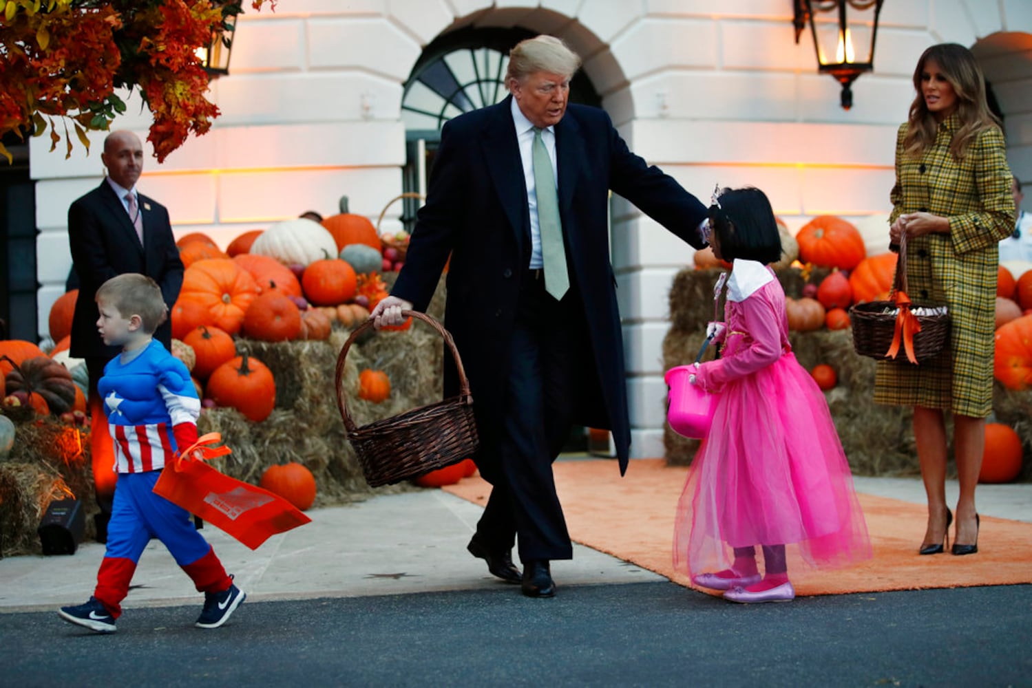 Photos: President Trump, first lady Melania Trump welcome children to White House for Halloween