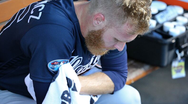 Braves starting pitcher Mike Foltynewicz reacts in the dugout after giving up a home run to the Los Angeles Dodgers in the first inning. The Braves lost 6-0. Curtis Compton/ccompton@ajc.com