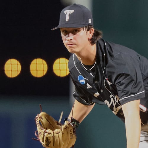 FILE - Troy pitcher Benjamin Stubbs throws during an NCAA regional baseball game against Miami on May 29, 2026, in Gainesville, Fla. (AP Photo/Gary McCullough, File)