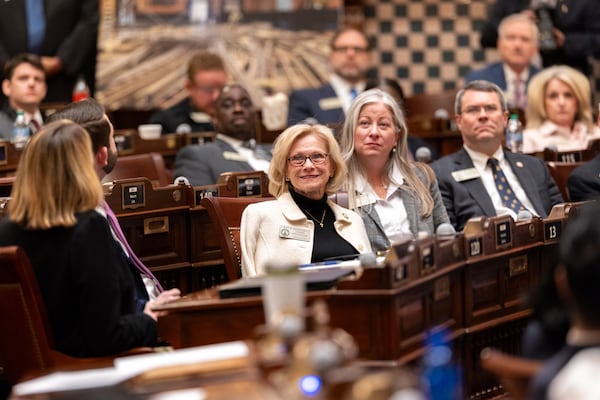 State Rep. Katie Dempsey (center), seen here at the Georgia Capitol in January. (Arvin Temkar/AJC)