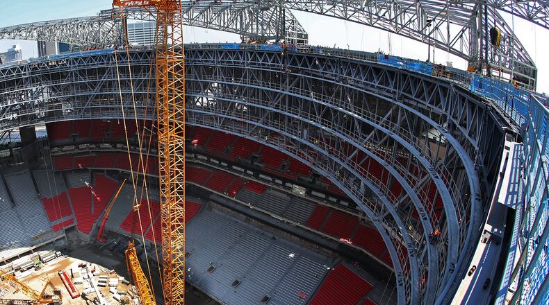The view from the roof of Mercedes-Benz Stadium earlier this month, looking down on what will become the playing field. Curtis Compton/ccompton@ajc.com