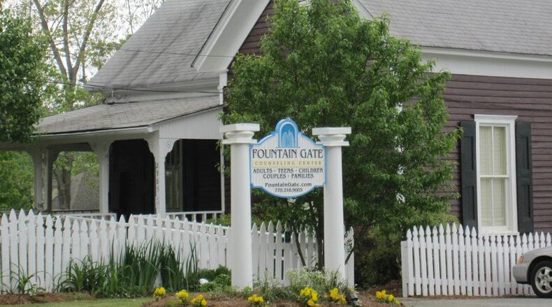 Two historic houses on Cherokee Street, including this one, will be relocated to make way for a residential community. Courtesy of Fountain Gate Counseling Center