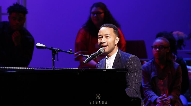 In this file photo, John Legend performs on stage during a concert following the ribbon cutting for the new John Legend Theater in Springfield, Ohio.