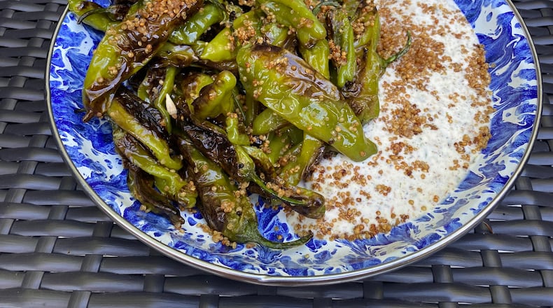 Blistered Shishitos with Furikake Ranch and Crispy Quinoa.
Ligaya Figueras / ligaya.figueras@ajc.com