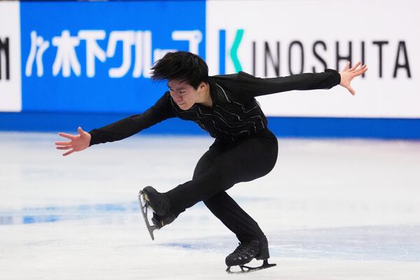 Yuma Kagiyama, of Japan, skates during the men's short program at the figure skating world championships, Thursday, March 27, 2025, in Boston. (AP Photo/Charles Krupa)