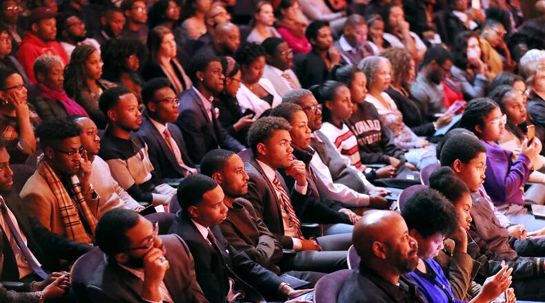 A crowd of mostly college students listen to presidential hopeful Pete Buttigieg, Mayor South Bend, Indiana, speak while launching a new effort to win over black voters by holding a conversation at Morehouse College on Monday, November 18, 2019, in Atlanta.