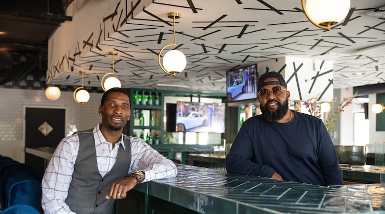 Rashad Sanford (left) and “Barney” Lee Berry Jr. at their restaurant, Breakfast at Barney's.