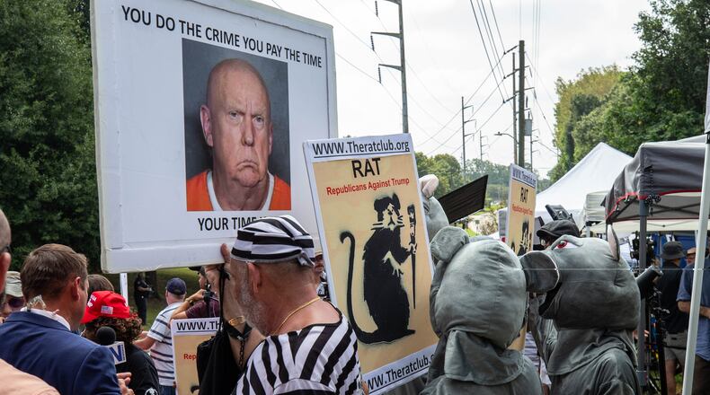 Protesters at the Fulton County Jail waiting for Trump’s arrival in Atlanta on Thursday, August 24, 2023. (Katelyn Myrick/katelyn.myrick@ajc.com)