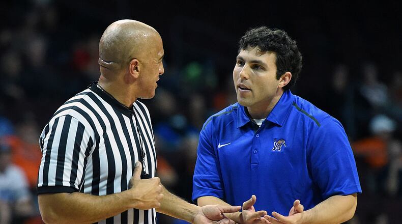 LAS VEGAS, NV - NOVEMBER 28: Head coach Josh Pastner of the Memphis Tigers talks with a referee during a timeout in the team's game against the Indiana State Sycamores during the 2014 Continental Tire Las Vegas Invitational basketball tournament at the Orleans Arena on November 28, 2014 in Las Vegas, Nevada. Memphis won 72-62. (Photo by Ethan Miller/Getty Images)