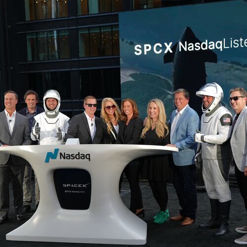 SpaceX executives pose during a closing bell ceremony for the IPO of SpaceX at the Nasdaq MarketSite in New York, Friday, June 12, 2026, in New York. (AP Photo/Frank Franklin II)