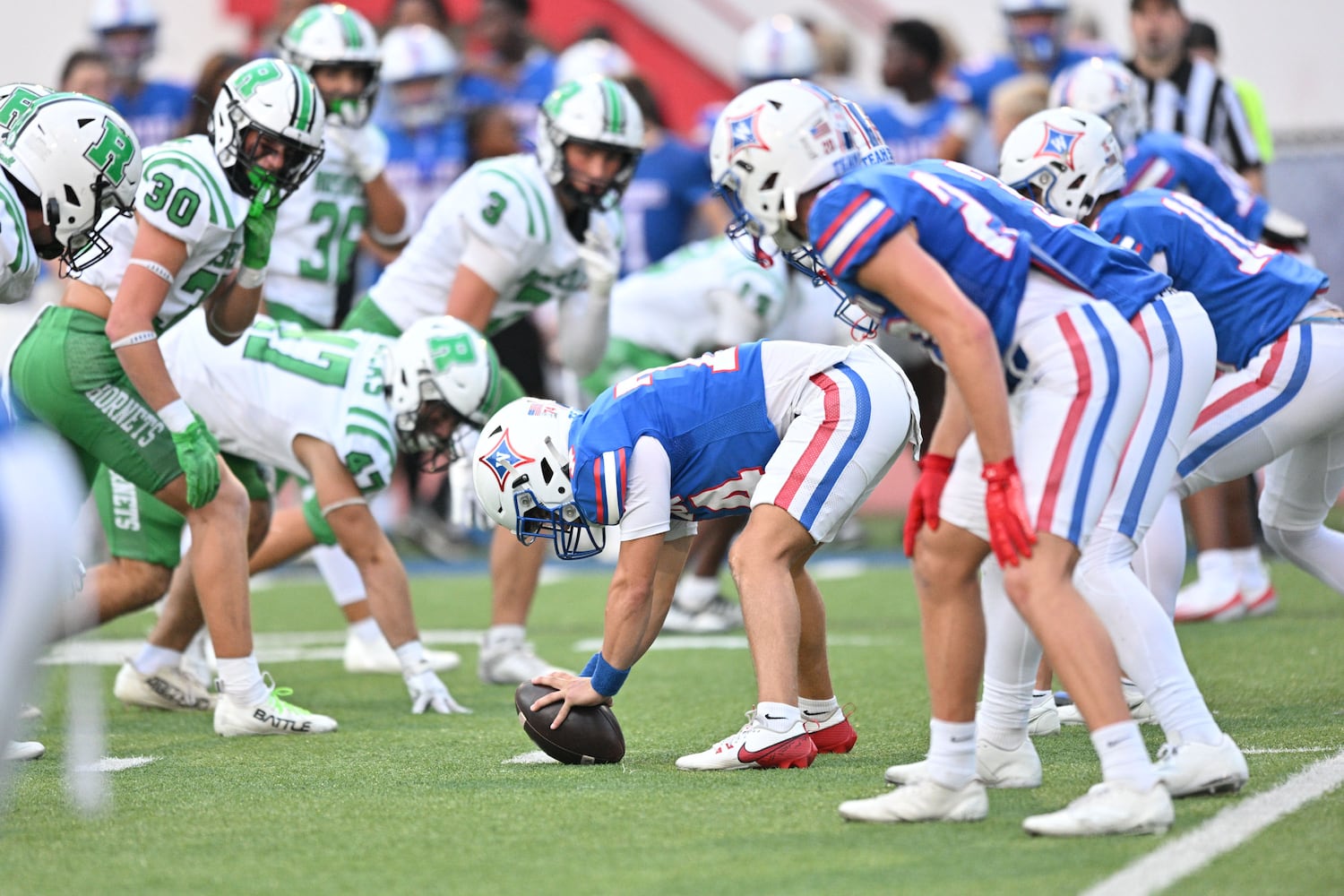 The Walton Raiders defend their home turf during a game against the Roswell Hornets  Friday, August 29, 2025 at Walton High School. (Daniel Varnado/For the Atlanta Journal-Constitution)