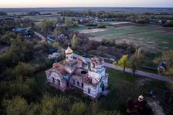 A church destroyed in fighting between Russian and Ukrainian forces is seen from above during celebration of the Orthodox Easter in Lukashivka village, Ukraine, on Sunday, April 20, 2025. (AP Photo/Evgeniy Maloletka)