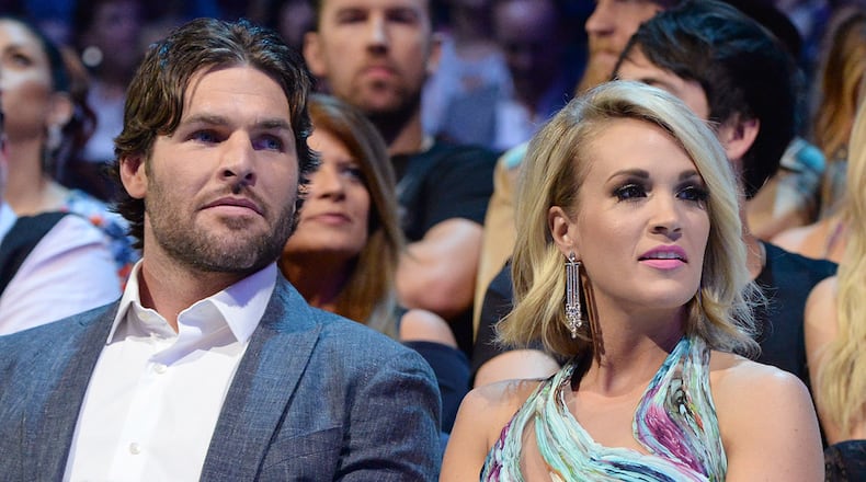 Mike Fisher and Carrie Underwood (Photo by Kevin Mazur/WireImage)