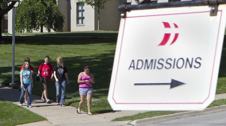 Dozens of Georgia colleges and universities are offering waivers for application fees in November. (AP photo)