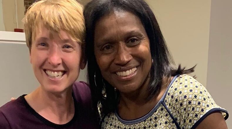 Dr. Carla Neal-Haley (right) poses for a photo with liver donor Cathie Seibert before her transplant in April. The two had just participated in a prayer service for Neal-Haley at The Lovett School. CONTRIBUTED