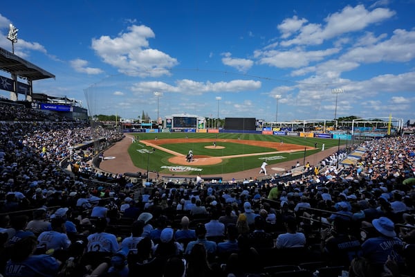 A sell out crowd watches during the second inning of a baseball game between the Tampa Bay Rays and the Colorado Rockies at Steinbrenner Field Friday, March 28, 2025, in Tampa, Fla. (AP Photo/Chris O'Meara)