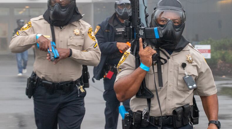 Gwinnett County law enforcement conducts an active drill exercise at the Gwinnett County Courthouse on Saturday, Dec 2, 2023 coordinating five law enforcement departments.  (Jenni Girtman for The Atlanta Journal-Constitution)
