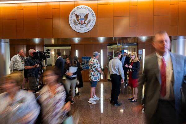 Sheri Lilley speaks to media outside of the boardroom on the first day of the NTSB hearings in Washington, D.C., on July 30, 2025. While she'd barely done a media interview before the crash, Lilley and her husband Tim have since done dozens, speaking out about needed reforms. (Craig Hudson for the AJC)