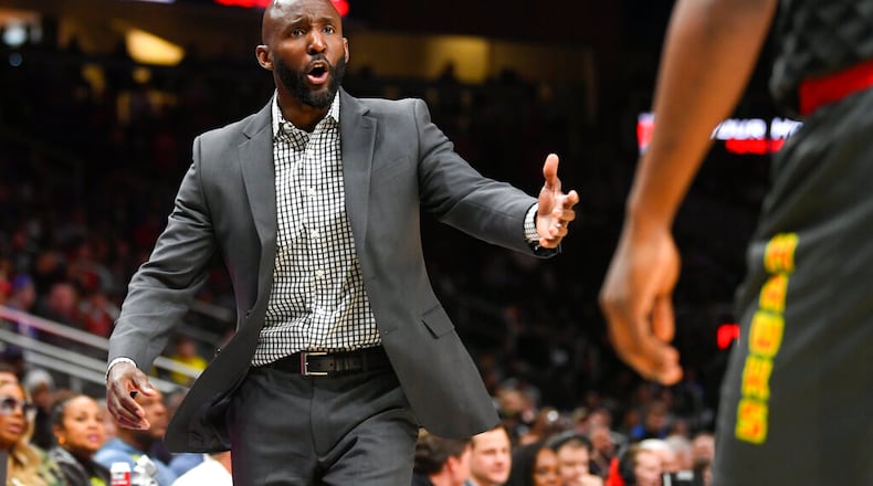 Atlanta Hawks head coach Lloyd Pierce reacts on the sideline during the first half of an NBA basketball game against the Orlando Magic Wednesday, Feb. 26, 2020, in Atlanta. (AP Photo/John Amis)