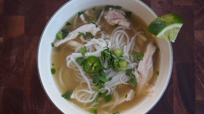 Rice noodles, peppery ginger and citrusy lemongrass transform chicken noodle soup into flavor-packed pho ga. CONTRIBUTED BY KELLIE HYNES
