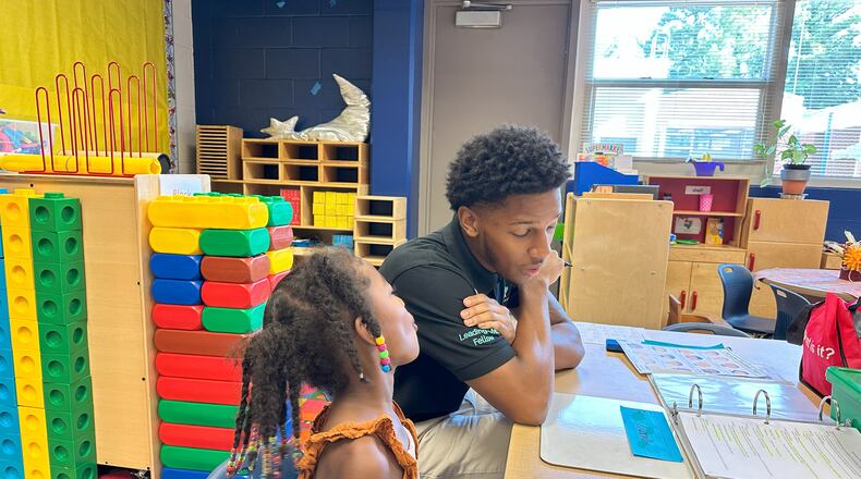 Zachary White works with 4-year-olds at Benteen Elementary as part of the Leading Men Fellowship, an innovative project that grew out of The Literacy Lab.