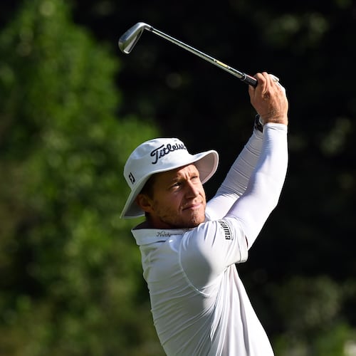 Peter Malnati hits from the 11th tee during the first round of the Rocket Classic golf tournament at the Detroit Golf Club, Thursday, July 30, 2026, in Detroit. (AP Photo/Jose Juarez)