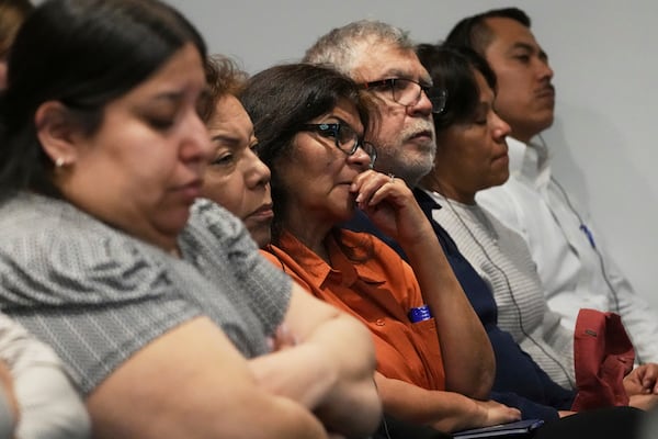 Victims family members react during the sentencing hearing for Robert E. Crimo III., at the Lake County Courthouse, in Waukegan, Ill., Wednesday, April 23, 2025. (AP Photo/Nam Y. Huh, Pool)
