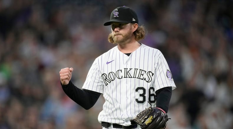 Colorado Rockies relief pitcher Pierce Johnson celebrates after getting Detroit Tigers' Eric Haase to hit into a double play to end a baseball game Friday, June 30, 2023, in Denver. (AP Photo/David Zalubowski)