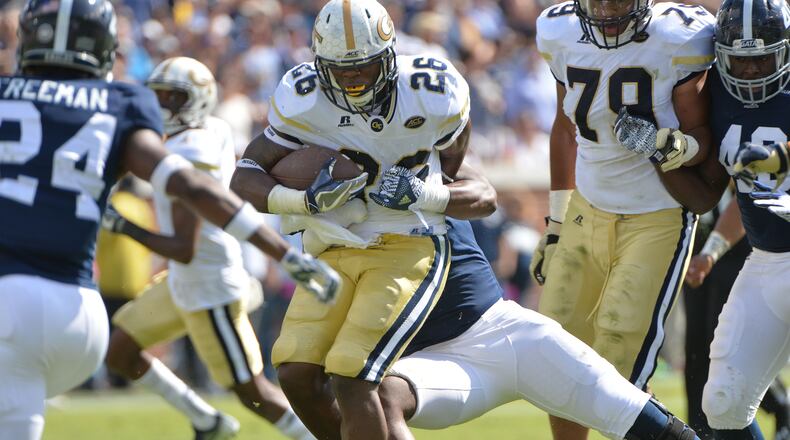 Georgia Tech B-back Dedrick Mills gained 89 yards, aided by the blocks of fellow freshmen Parker Braun and Jahaziel Lee. Georgia Tech won 35-24 over the Georgia Southern. HYOSUB SHIN / HSHIN@AJC.COM