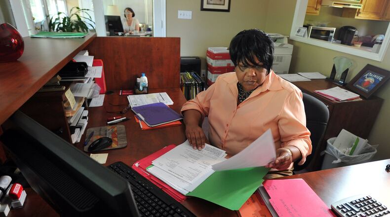 Paulette Britton, a traffic manager with Dolphin Shipping & Trading Inc. started working for the company as a temporary employee before being hired full time. BRANT SANDERLIN /BSANDERLIN@AJC.COM