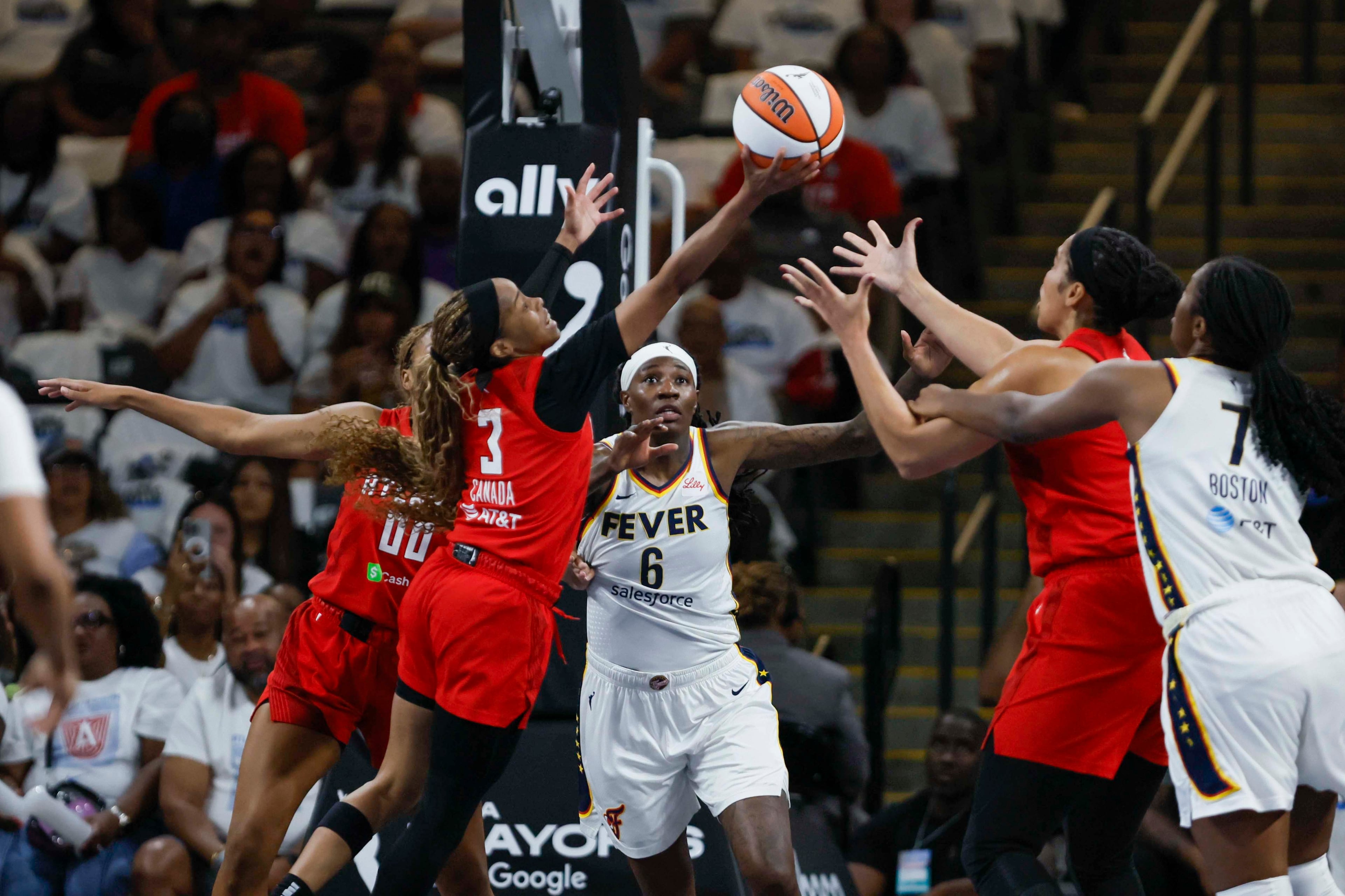 Atlanta Dream guard Jordin Canada (3) fights for possession during the second half of a WNBA basketball first-round playoff game against the Indiana Fever at Gateway Center Arena on Sunday, Sept. 14, 2024, in Atlanta. (Miguel Martinez/ AJC)
