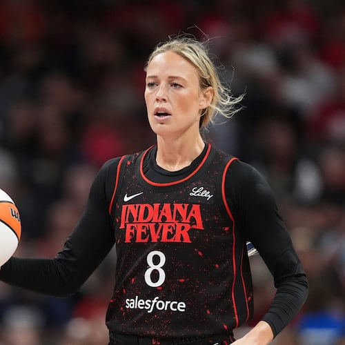FILE - Indiana Fever guard Sophie Cunningham (8) plays against the Dallas Wings in the second half of a WNBA basketball game in Indianapolis, Aug. 12, 2025. (AP Photo/Michael Conroy, File)