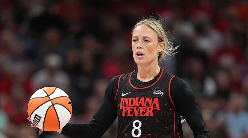 FILE - Indiana Fever guard Sophie Cunningham (8) plays against the Dallas Wings in the second half of a WNBA basketball game in Indianapolis, Aug. 12, 2025. (AP Photo/Michael Conroy, File)