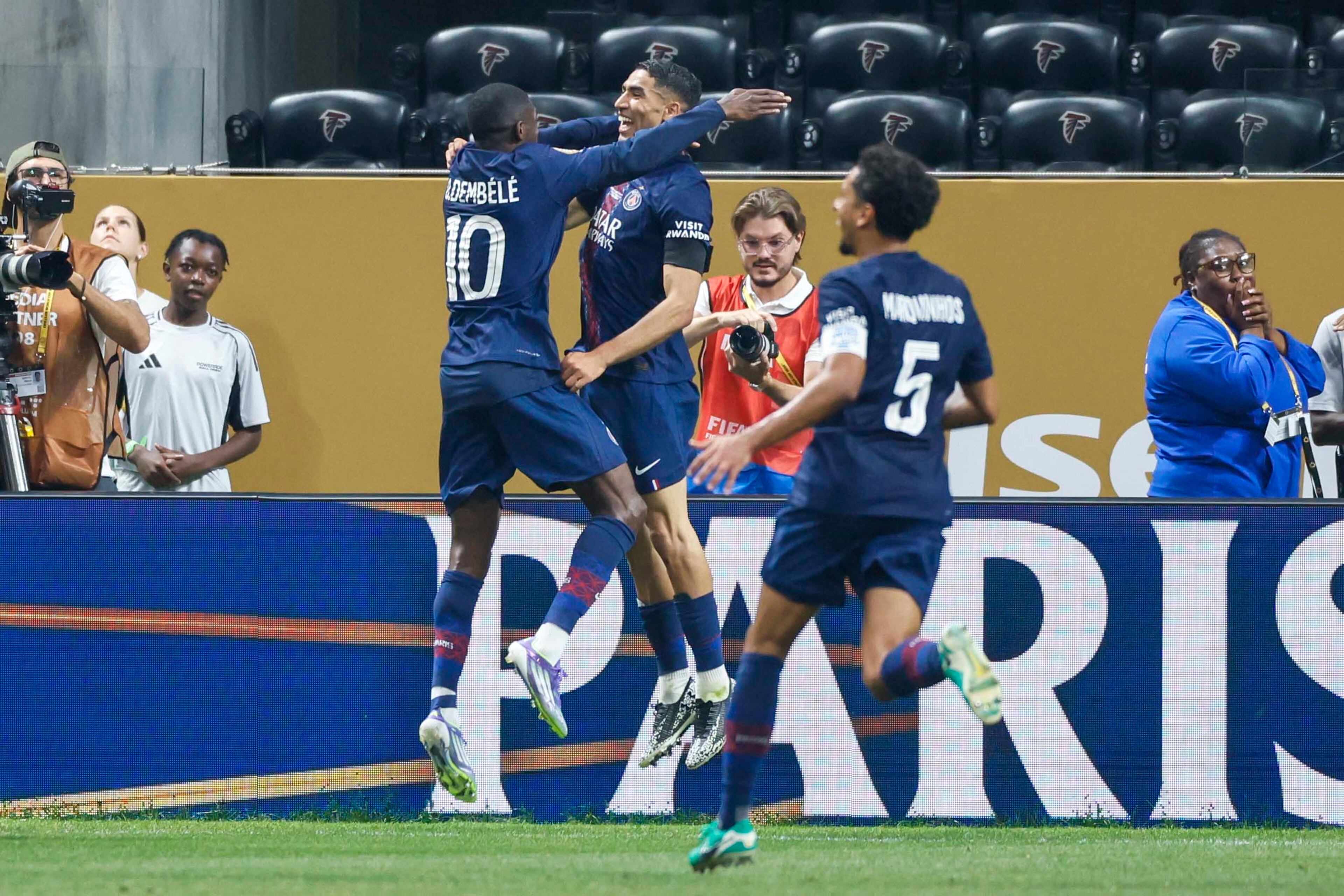 Paris Saint-Germain forward Ousmane Dembélé (10) celebrate with teammates after scoring his team’s second goal during the Club World Cup quarterfinal soccer match between Paris Saint-Germain and Bayern Munich, Saturday, July 5, 2025.
(Miguel Martinez/ AJC)