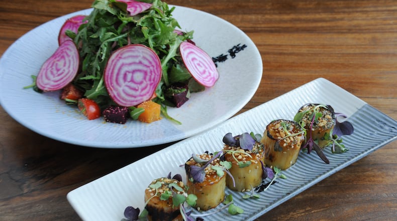 MAY: John Kessler wrote of the service at Doraku in Buckhead, "There’s a lot of friendliness, but no hustle." Read the full review here. Pictured: Eggplant Miso with Asian eggplant grilled with miso, sesame seeds and garlic chips, and roasted beet salad with tender red and golden beets with rocket greens, pickled onions and miso. (Beckysteinphotography.com)