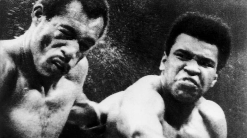 Muhammad Ali, right, lands a blow to the head of Ken Norton during a match in Inglewood, Calif., in September 1973. (United Press International/DPA/Zuma Press/TNS)