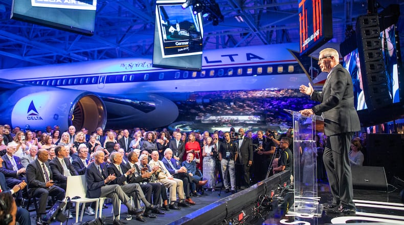 Delta Air Lines CEO Ed Bastian is on stage as Delta celebrates its 100-year anniversary on Saturday, March 15, 2025, at the Delta Flight Museum. (Jenni Girtman for The Atlanta Journal-Constitution)